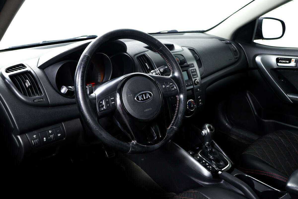 Kia Cerato, 2012 - Фото №12